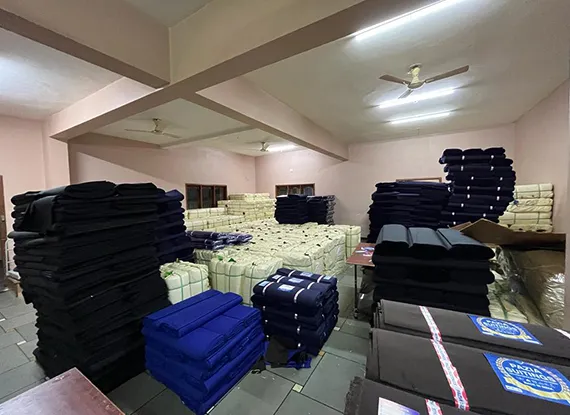 Quality control technician measuring fabric density and weave consistency