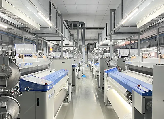 High-speed auto-weaving looms operating under digital tension control